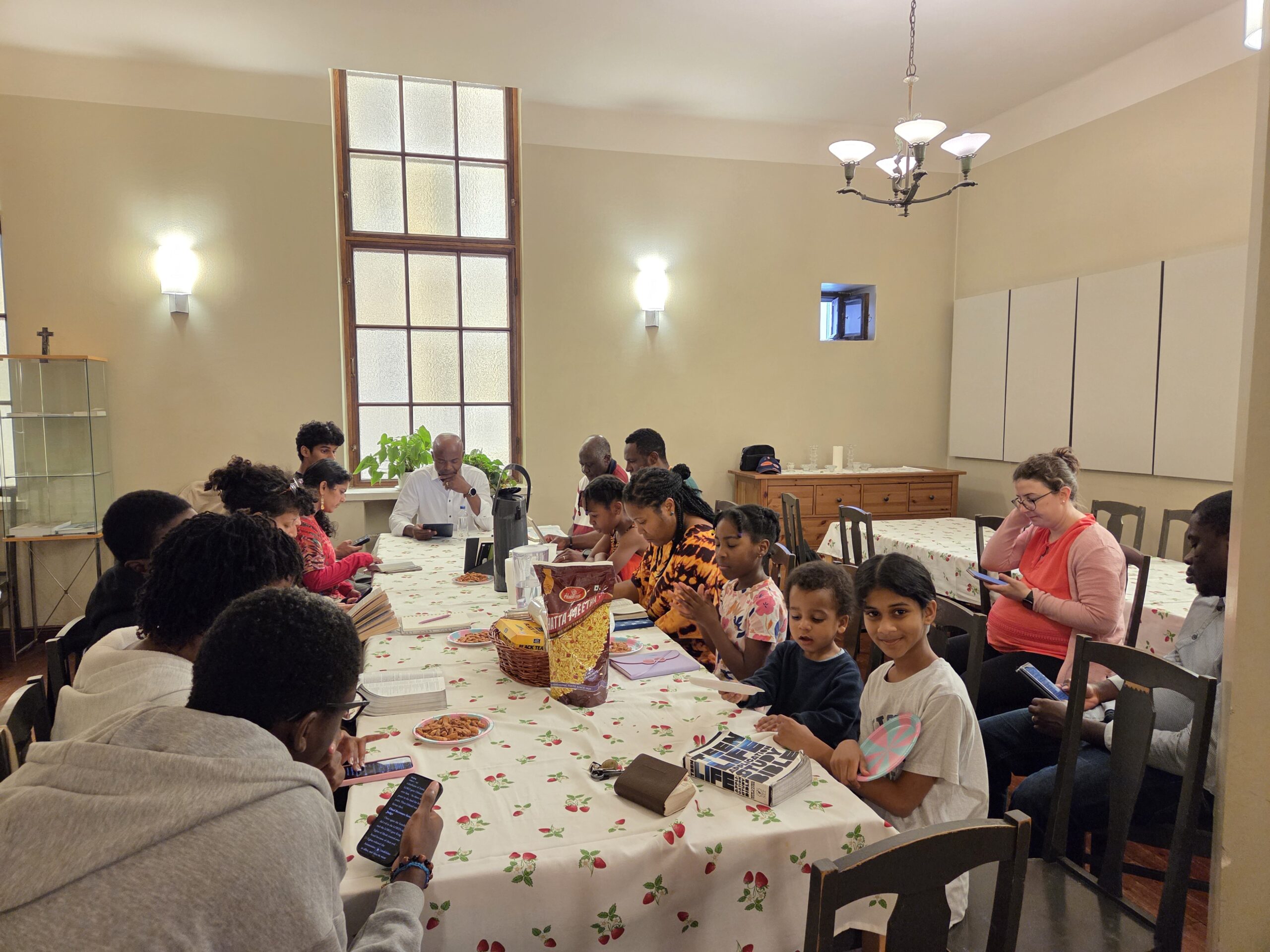 Church families sharing Bible study